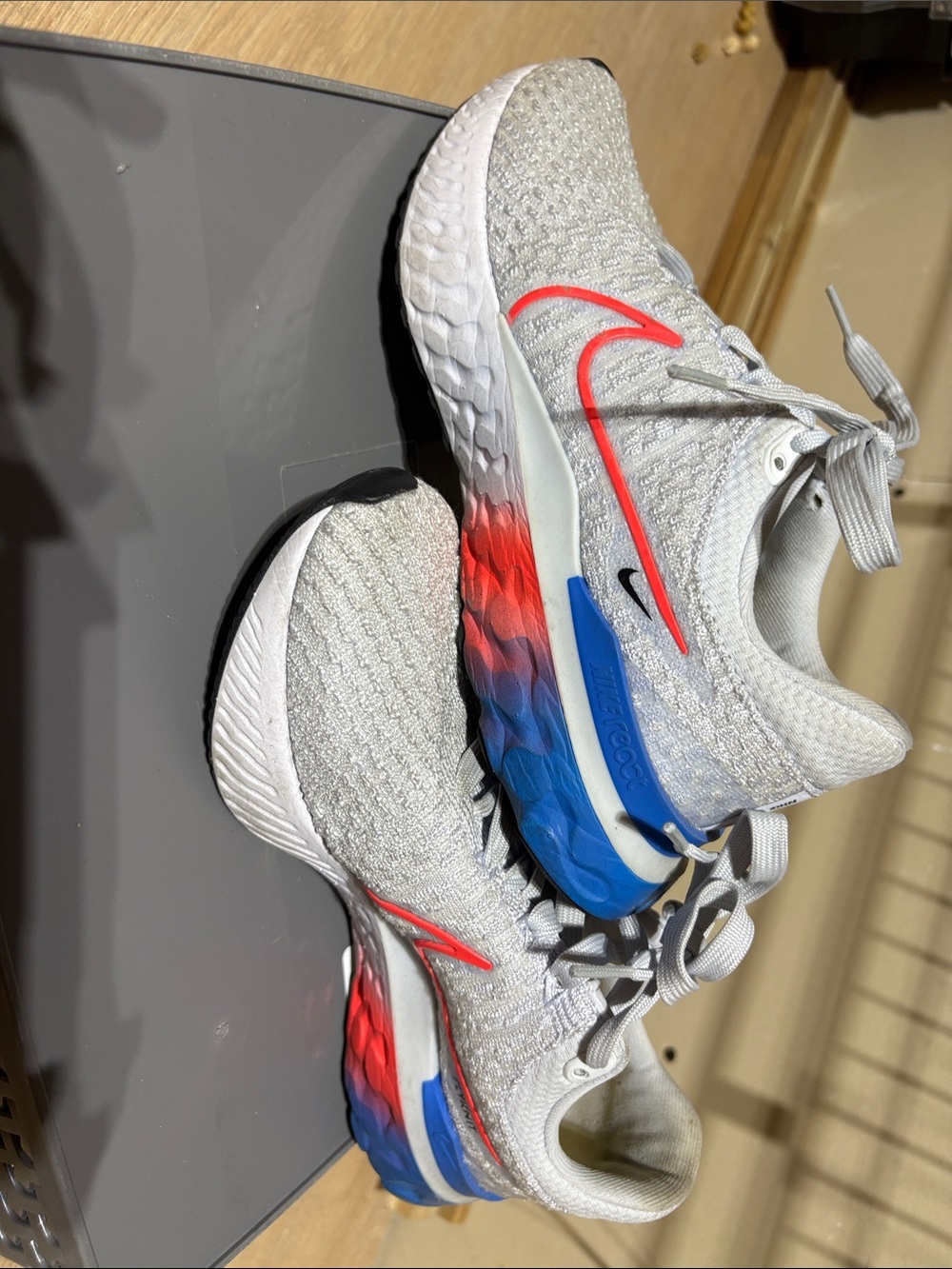 Nike React Infinity Flyknit 3 Running Sneakers — White with Blue & Red Accents